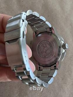 Citizen Nighthawk Eco-Drive GMT B877-S015979 Watch. Embossed Back